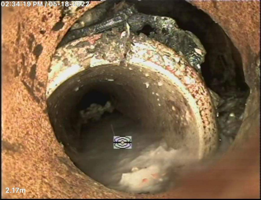 CCTV camera shot of broken drain pipe